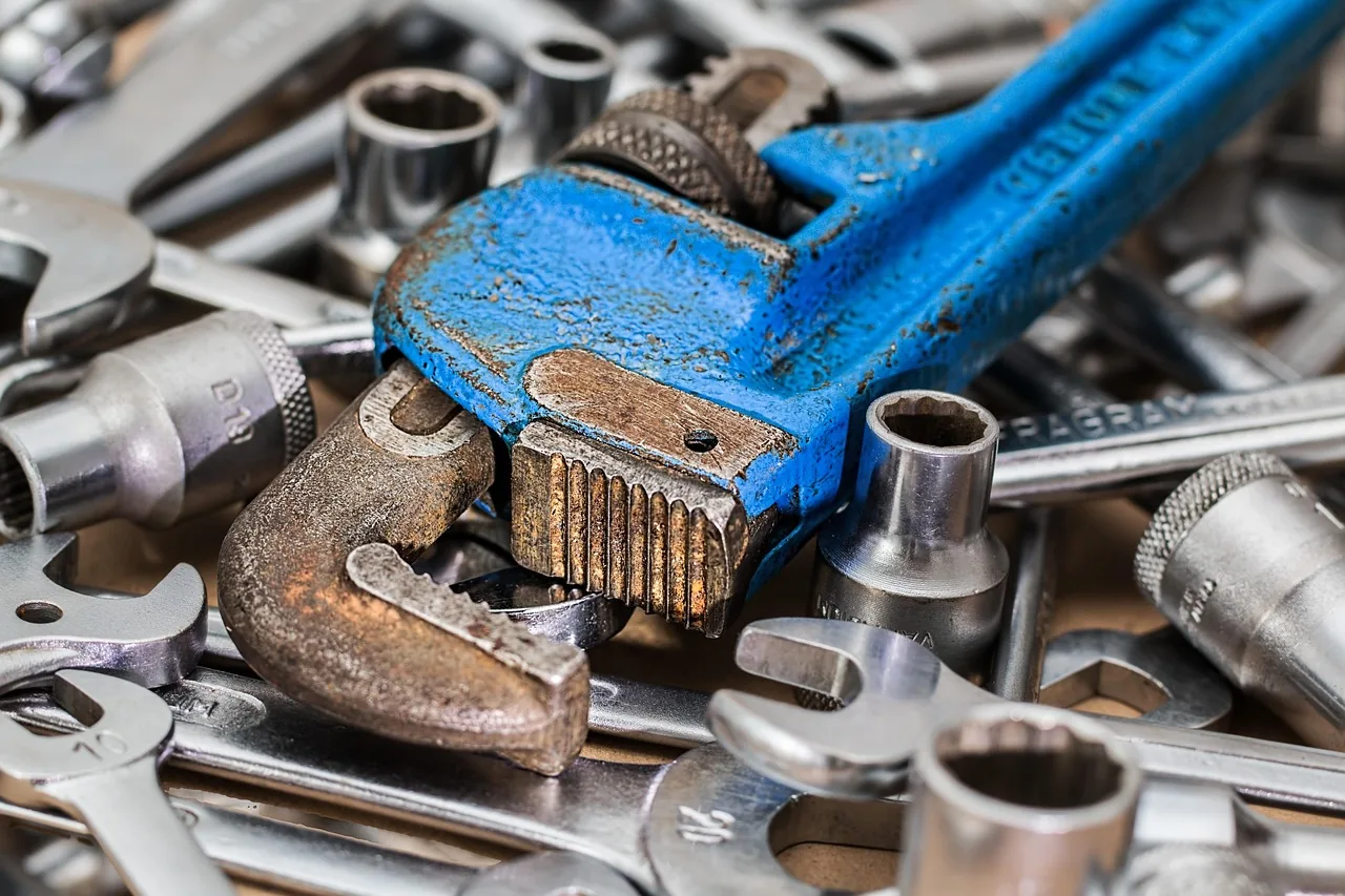 Assorted wrenches and sockets, representing the full range of locksmith services Flat Price Locksmith offers in Sacramento
